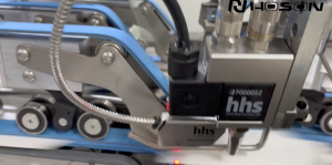 Baumer hhs drupa installation @ HOSON - Hot melt application